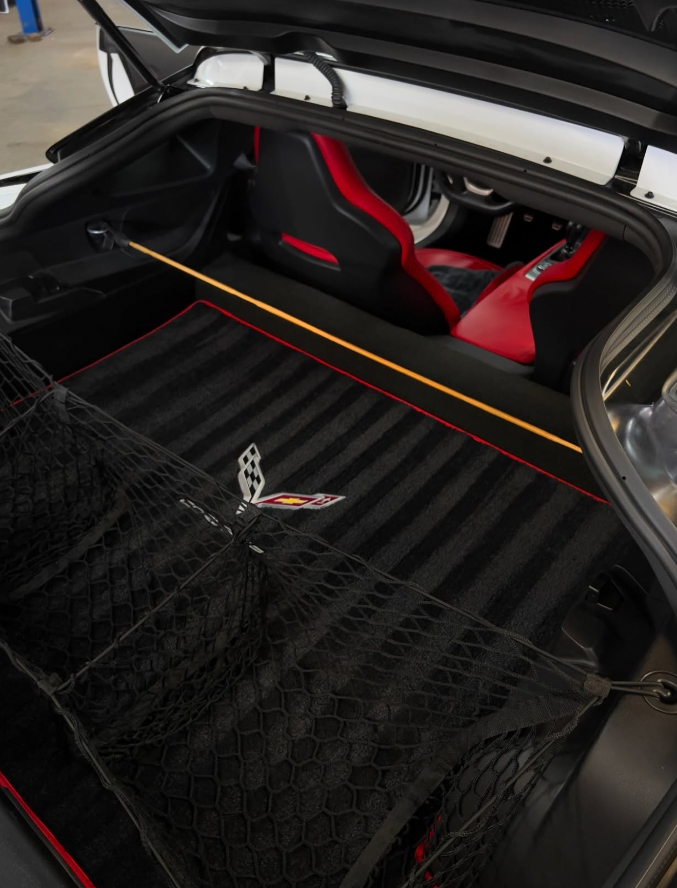 Clean Corvette rear cargo carpet and interior trim