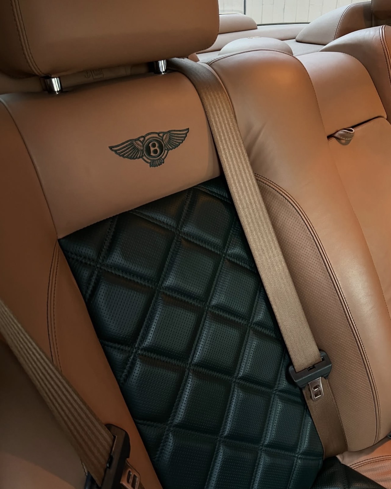 Bentley rear seat tan and green diamond stitched leather